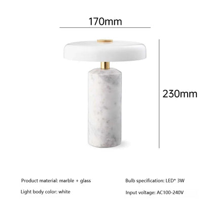 Marble table lamp switched off showing smooth weighted base form
