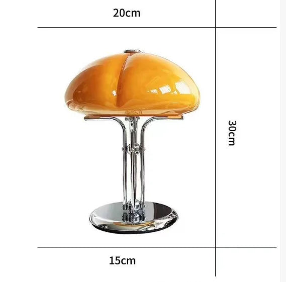 Pumpkin table lamp switched off showing clean Nordic orange shape