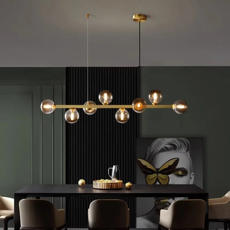 Ten head glass chandelier, 48 inches long, over a kitchen counter