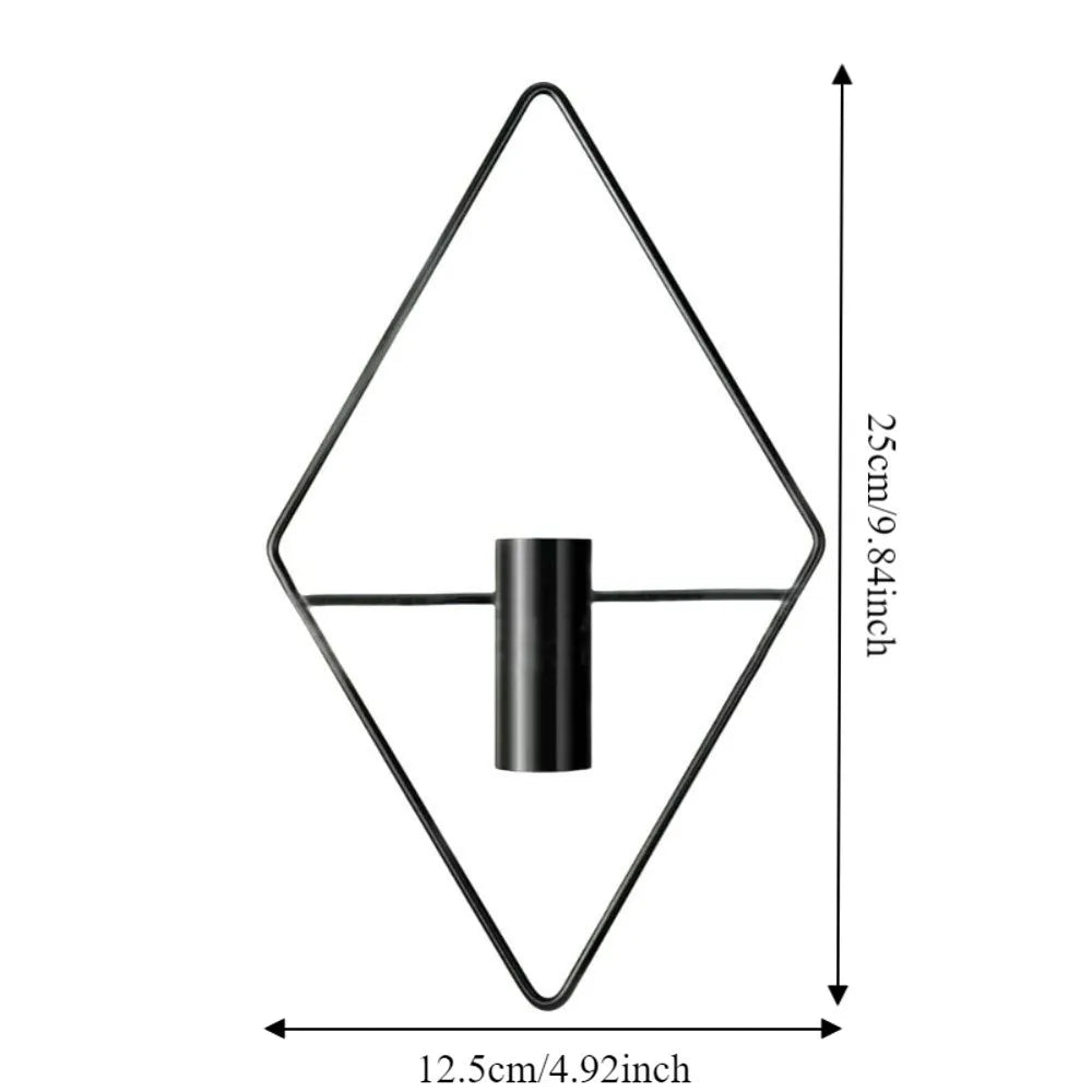 Side profile of black iron rhombus wall vase showing depth and wall mounting hardware