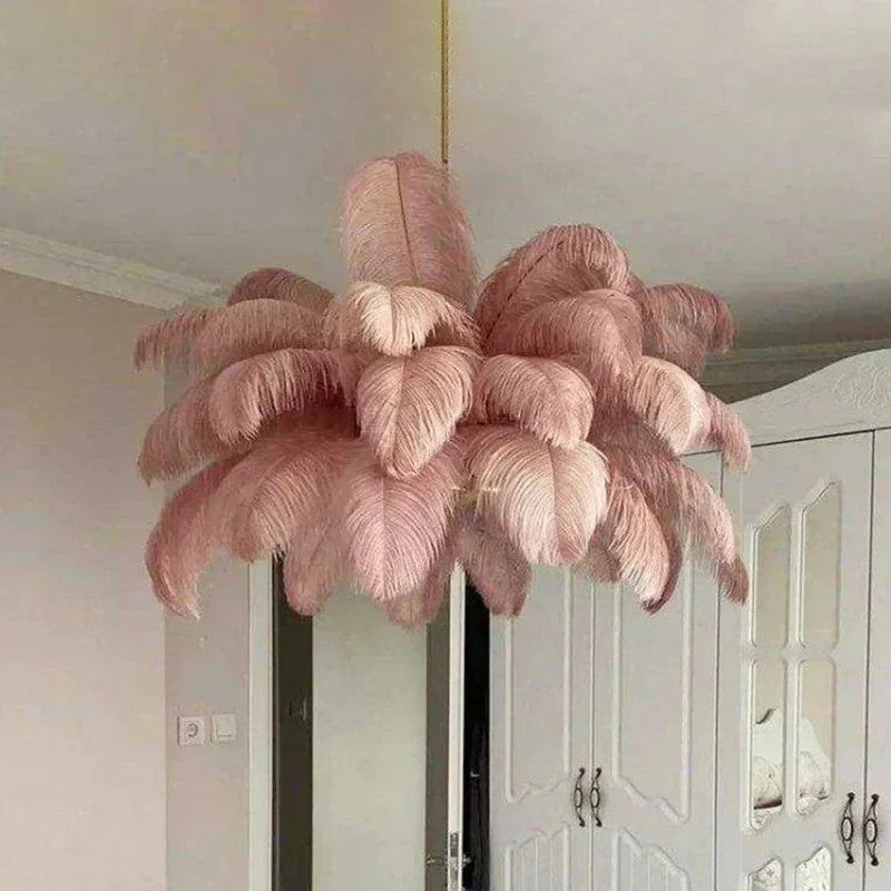 Pink feather chandelier at 31.5 in across in warm 3000K light