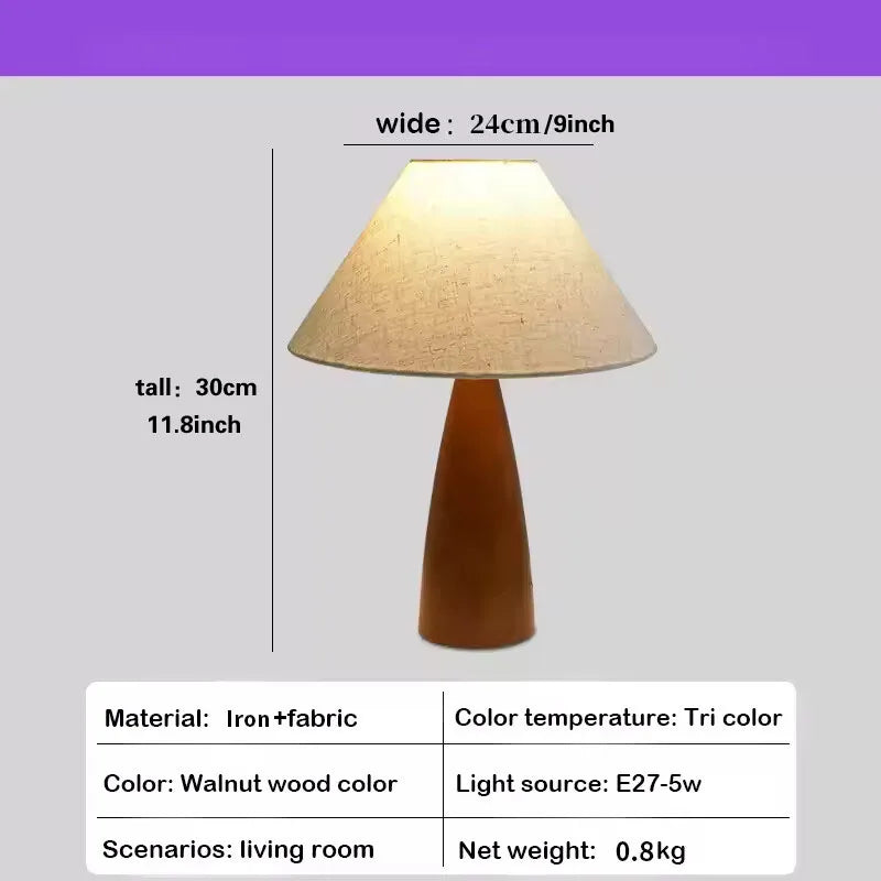 Iron fabric table lamp side profile showing vintage proportions