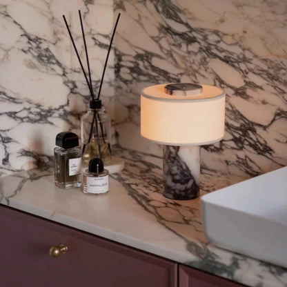 Bvlgari marble rechargeable table lamp warm light close-up view