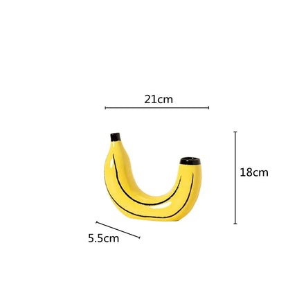 Side view of resin banana bunch vase showing realistic sculptural form