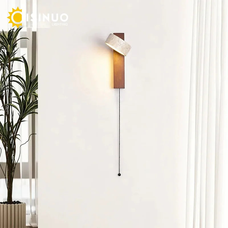 travertine stone wall sconce, installed in a room interior setting