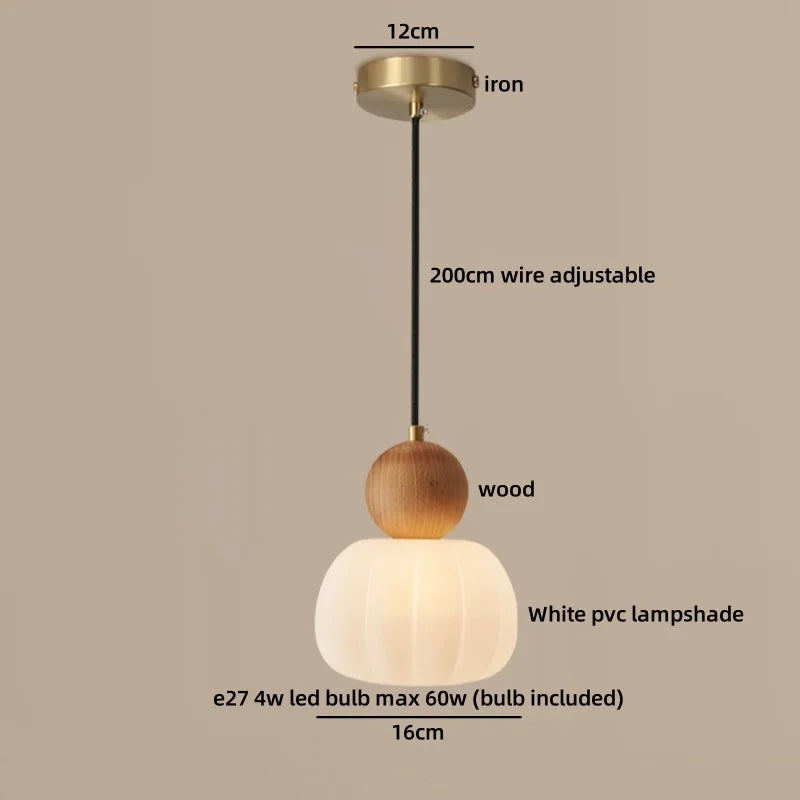 Simple white chandelier shade shown with its cord suspension and canopy