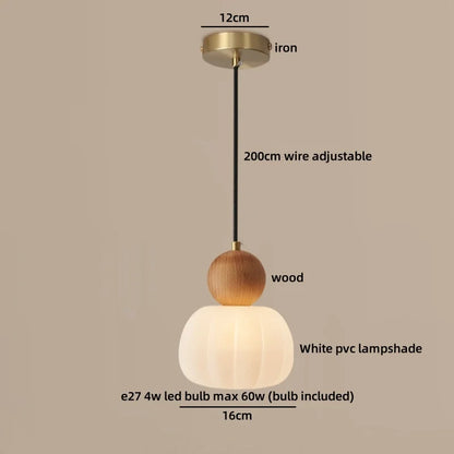 Simple white chandelier shade shown with its cord suspension and canopy