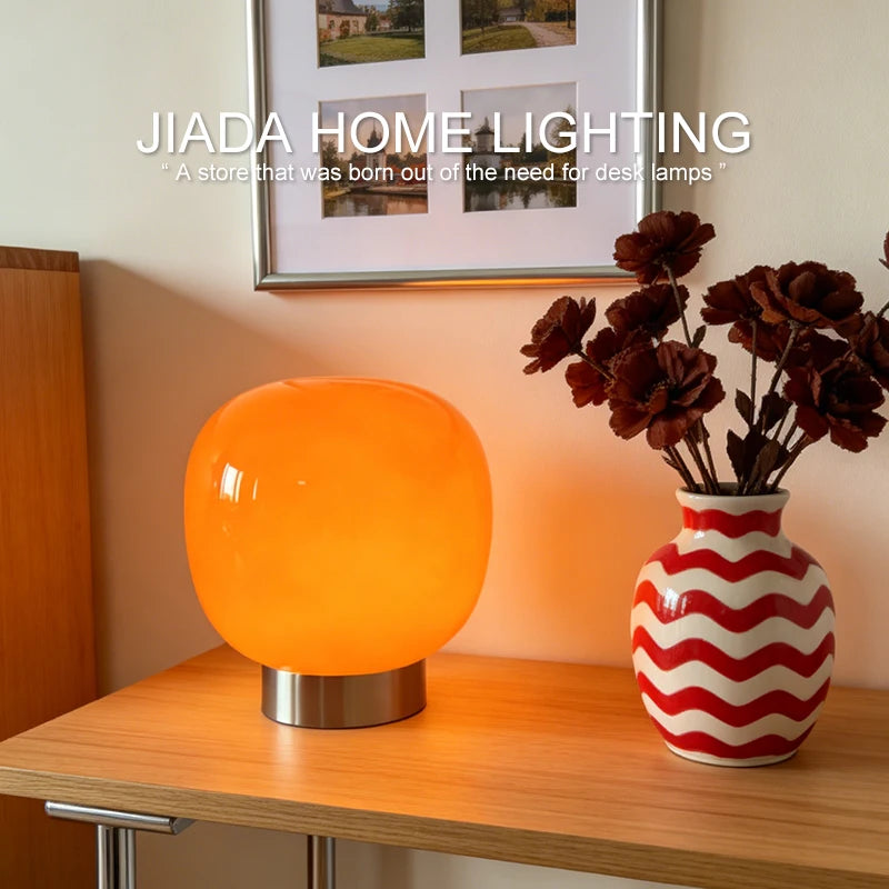 Mochi Glow white LED table lamp minimalist form in living room