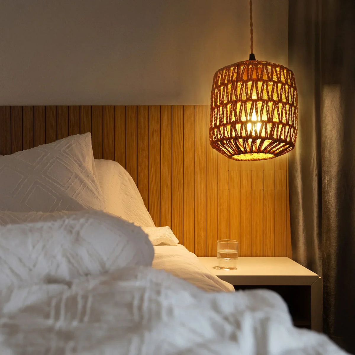 rattan wall sconce, side profile showing mounting depth