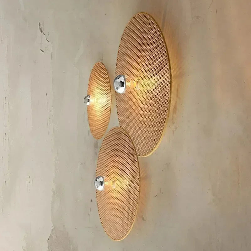 rattan wall sconce, detail view of fixture base and arm