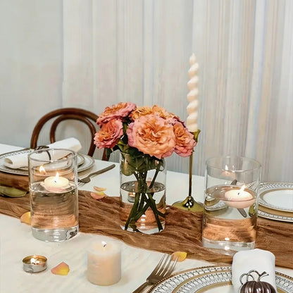 Tall acrylic vase with white roses as striking wedding table centerpiece display