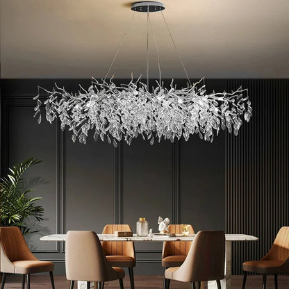 Round crystal chandelier at 17.7 in across on an adjustable chain pendant