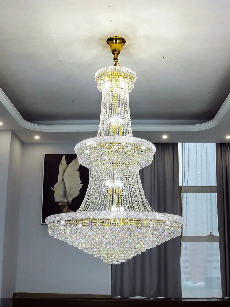 Stainless steel and crystal tiered chandelier on a chain pendant