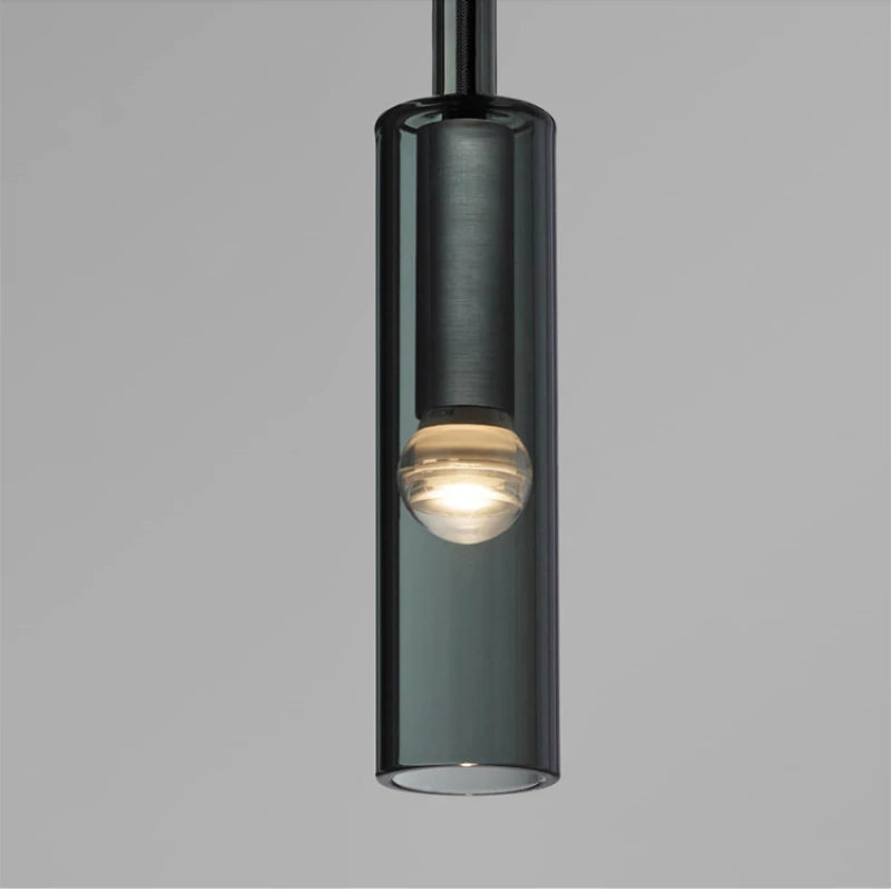 glass wall sconce, installed in a room interior setting