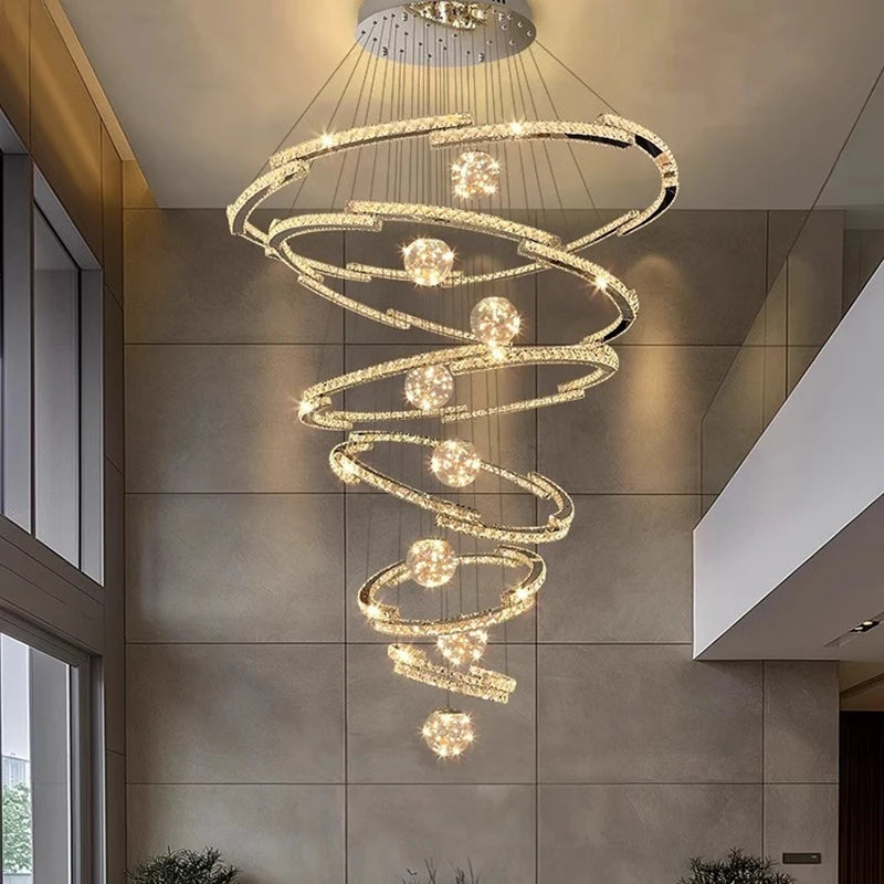 Cold white light across the crystal rings of a tiered chandelier