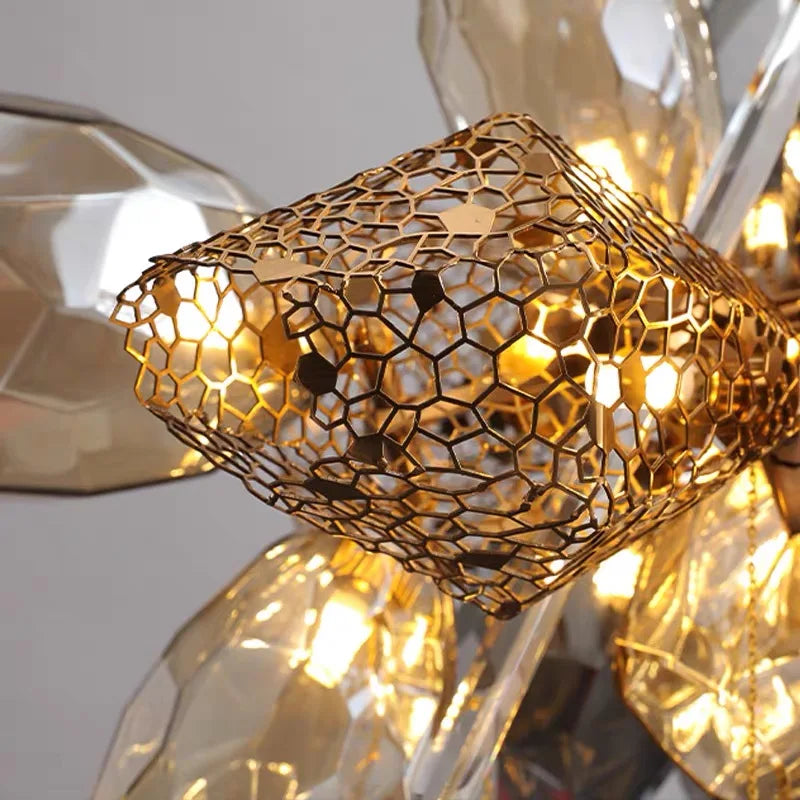 Electro-plated metal chandelier in gold with warm white G9 LED bulbs