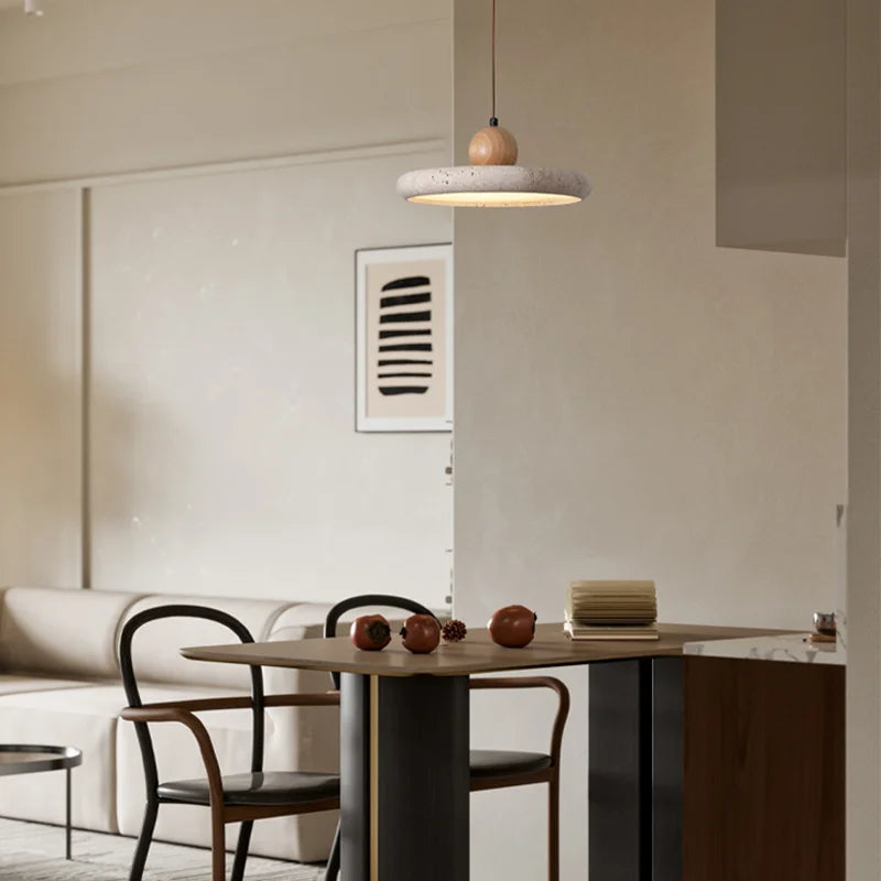 Through carved stone chandelier shade showing its natural veining