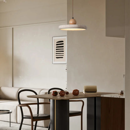 Through carved stone chandelier shade showing its natural veining