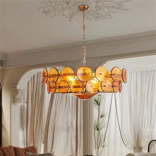 Vintage round glass chandelier with stained shades on an iron frame