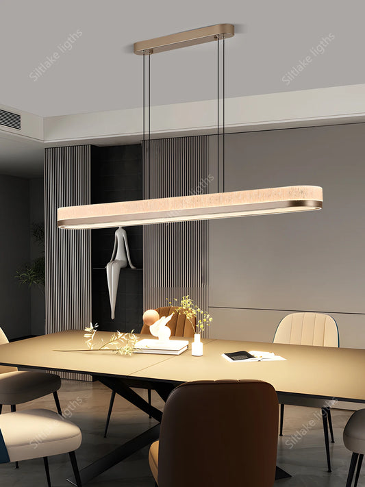 Champagne linear acrylic chandelier with acrylic blades on iron