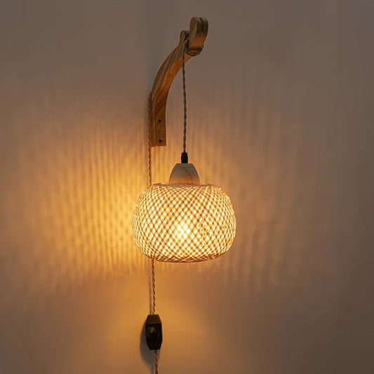 rattan wall sconce, front view on white background