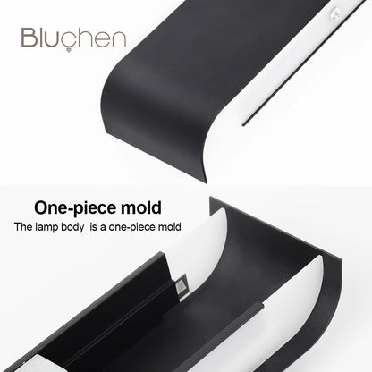 aluminum wall sconce, detail view of fixture base and arm