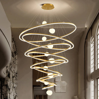 Four ring chandelier in gold with rings to 39.4 inches and a 98.4 inch drop