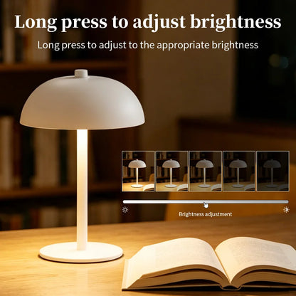 Gold mushroom night light warm mode glowing on bedroom nightstand