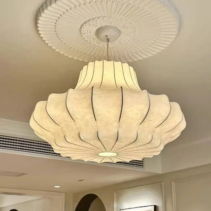 Wabi sabi silk chandelier with a hand knitted shade on a metal frame