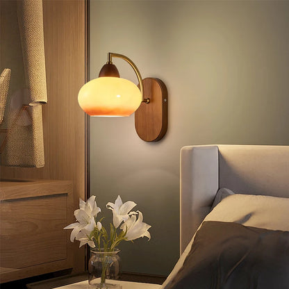 glass wall sconce, close-up of shade and hardware detail