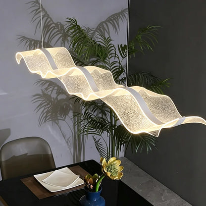 Wave pendant chandelier, 86.6 in long, lit in warm white light