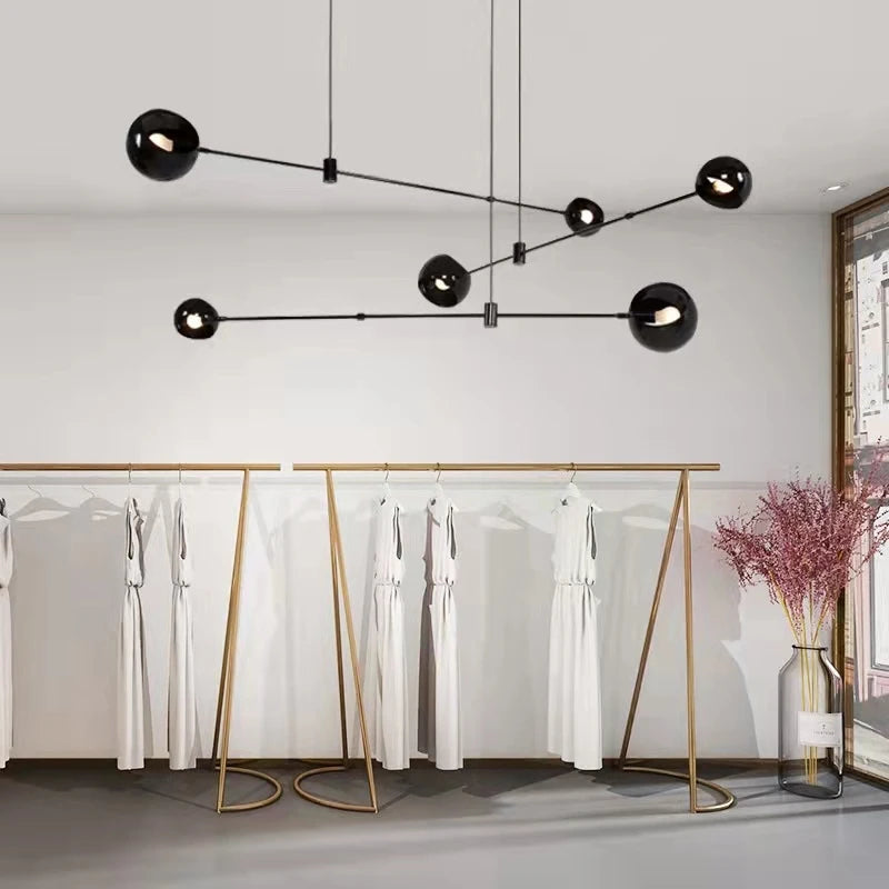 Two globe linear chandelier in black with G9 sockets, bulbs not included