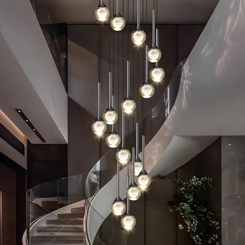 Gold framed crystal heads clustered down an open stairwell