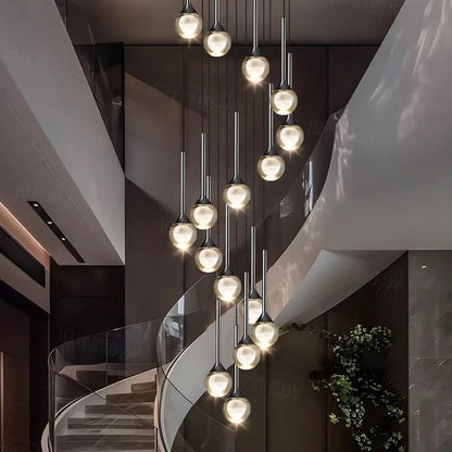 Gold framed crystal heads clustered down an open stairwell