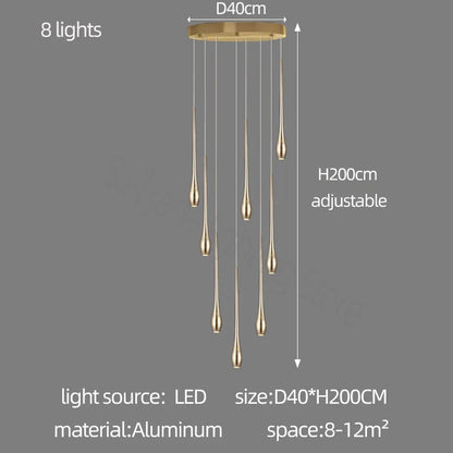 Twenty two light gilded chandelier spanning a duplex entry