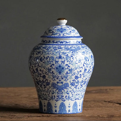 Oriental style ceramic vase green and blue colors displayed