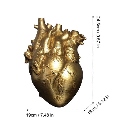 Heart vase desktop ornament styled with artificial flowers