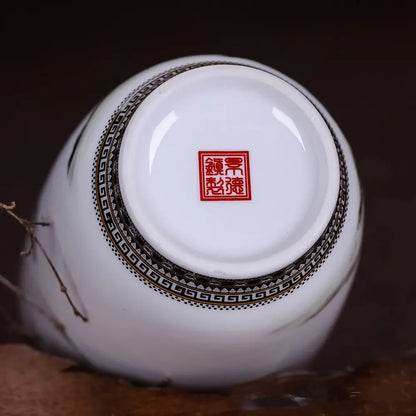 Style E Jingdezhen traditional porcelain vase with landscape motif on a shelf