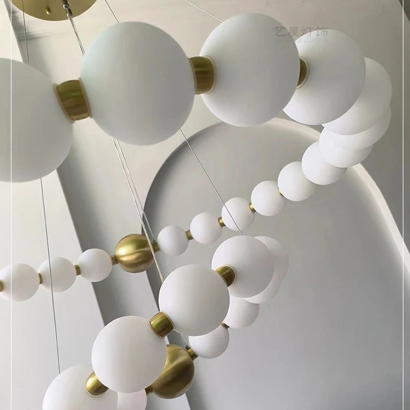 Two ring chandelier, 32.3 and 40.2 in across, in a gold finish