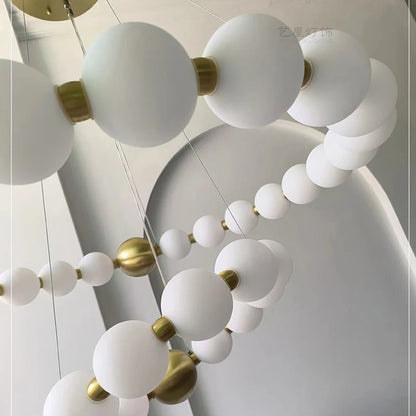 Two ring chandelier, 32.3 and 40.2 in across, in a gold finish