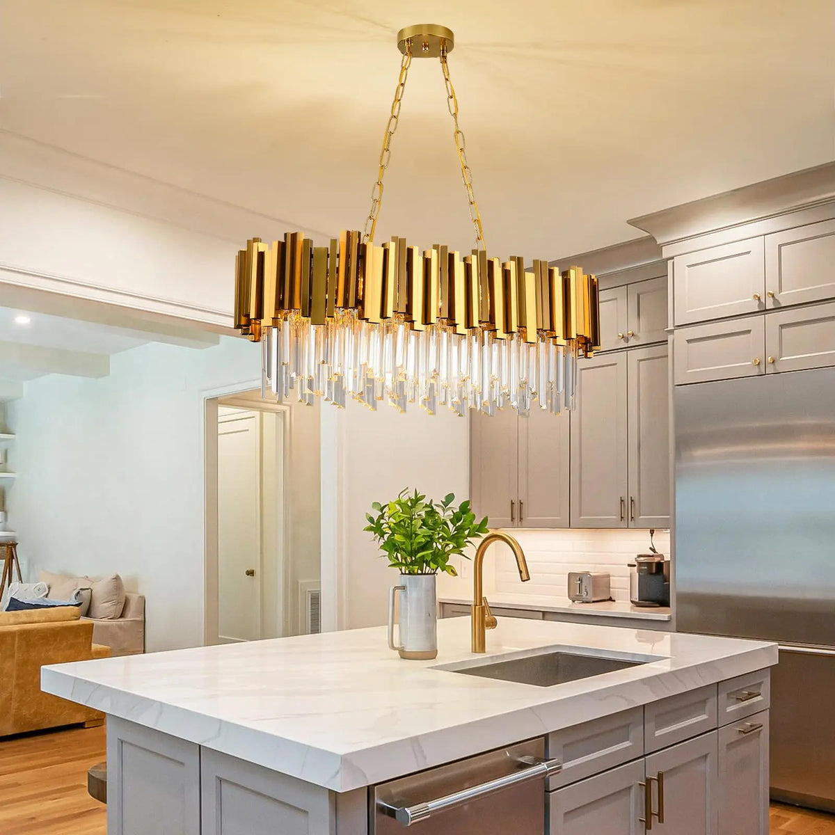 Cascading K9 crystal pendants on an elongated gold chandelier frame
