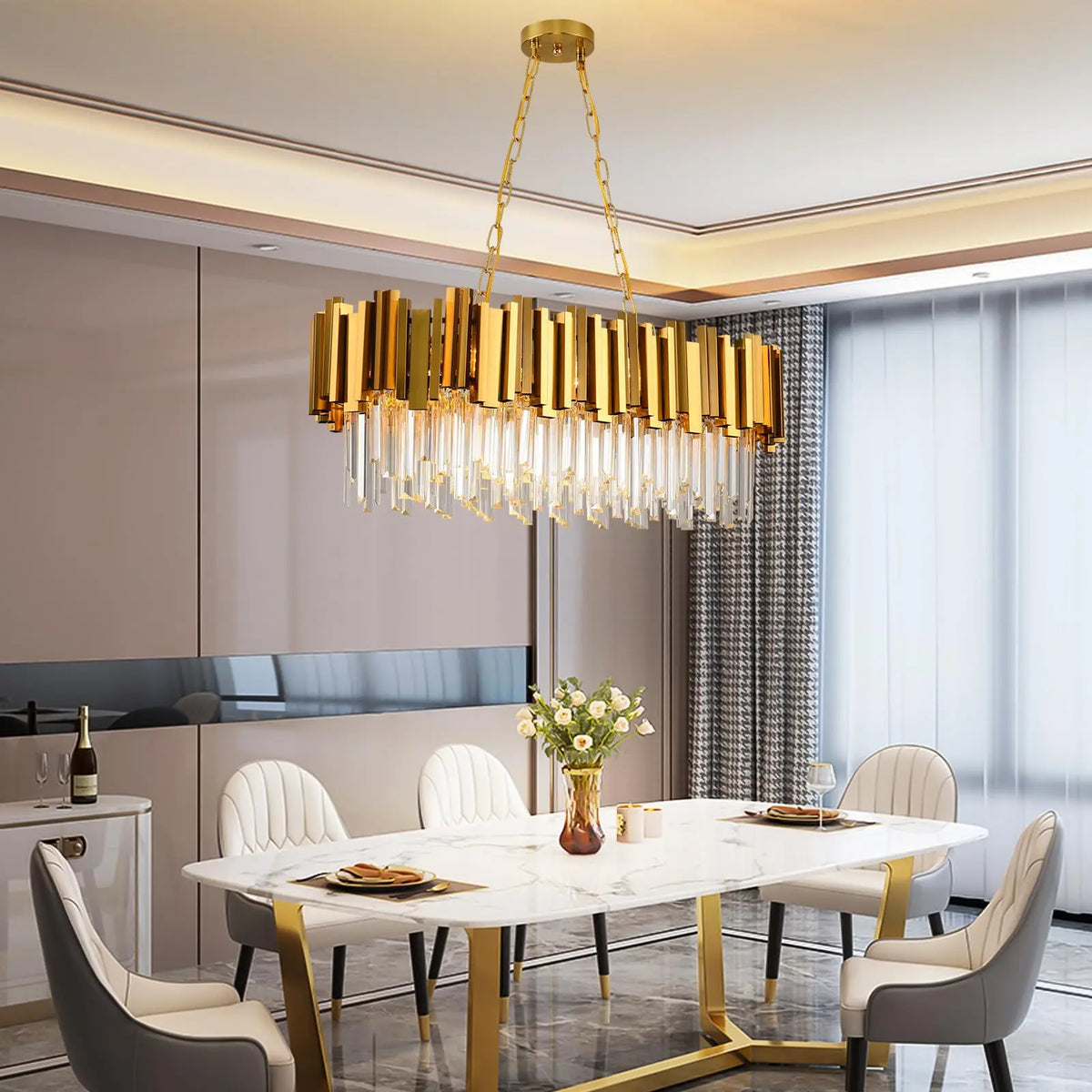 Polished gold oval chandelier frame hung with K9 crystal drops