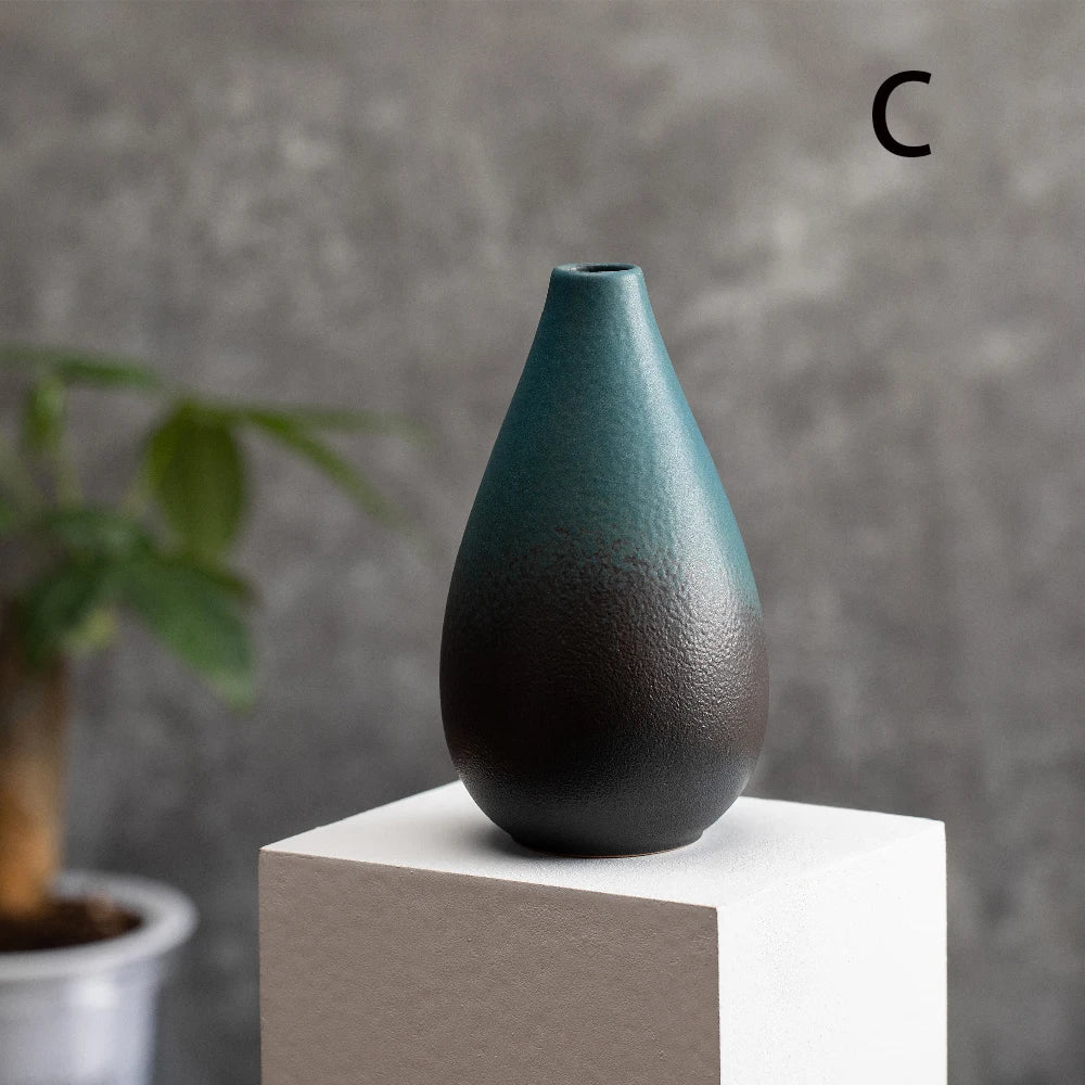 Side view of style E small frosted ceramic bud vase showing slender elegant silhouette