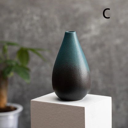 Side view of style E small frosted ceramic bud vase showing slender elegant silhouette
