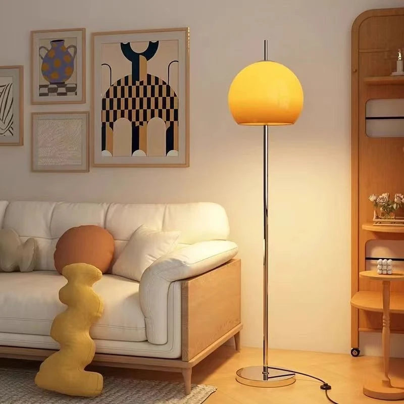 Retro floor lamp standing in bedroom corner casting atmospheric warm light