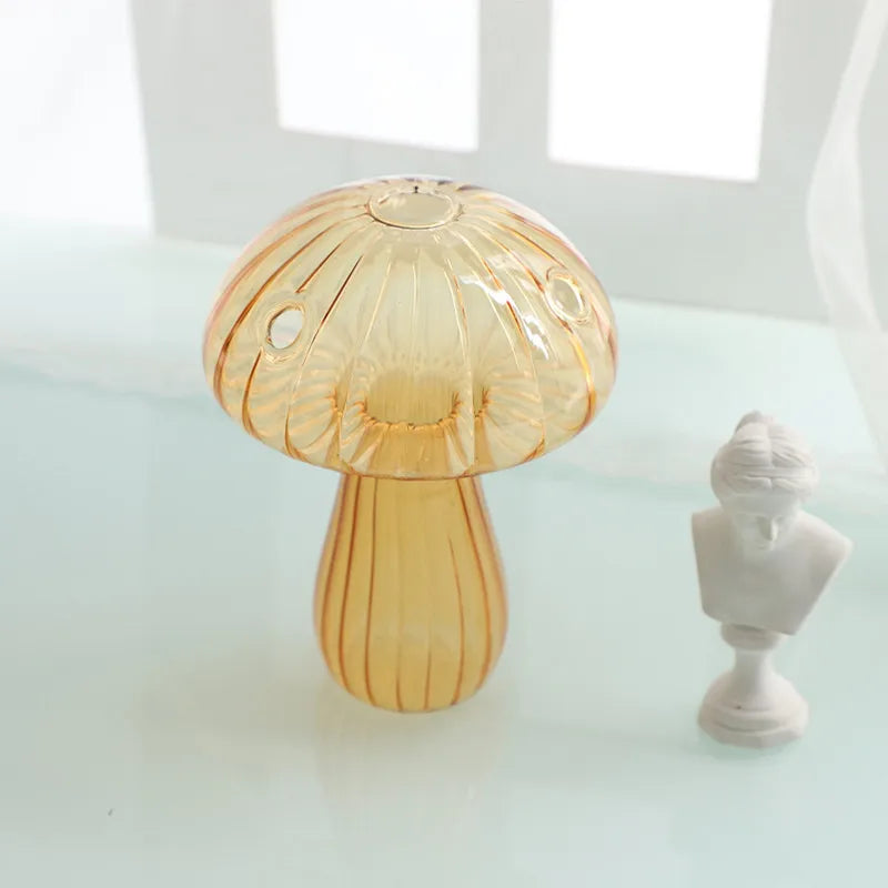 Mini mushroom glass vases grouped in a botanical propagation arrangement