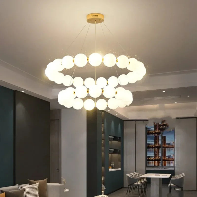 Pearl bead ring chandelier with white beaded strands on an iron frame