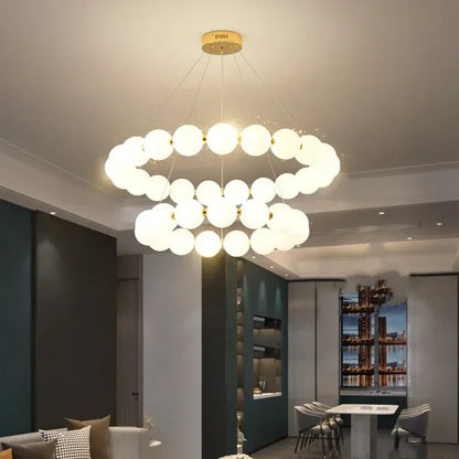 Pearl bead ring chandelier with white beaded strands on an iron frame