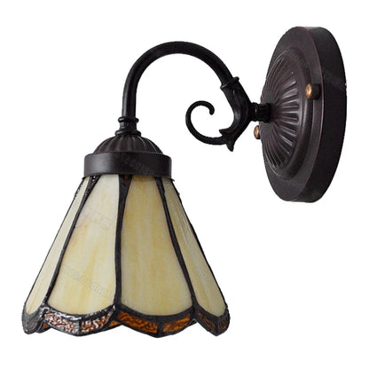 glass bathroom wall sconce, detail view of fixture base and arm