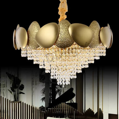 Gold crystal tassel chandelier with cascading strands on stainless steel